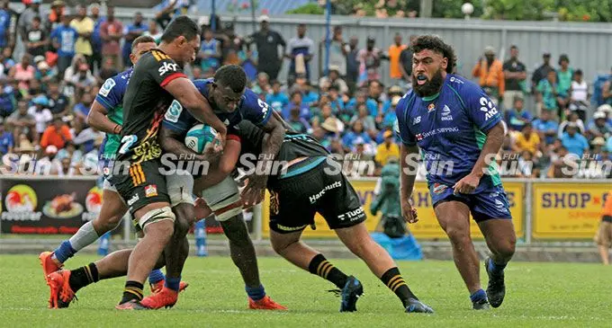 Swire Shipping Fijian Drua’s openside flanker Rusiate Nasove holds on to the ball against the Chiefs while prop Haereiti Hetet comes in to support during their Super Rugby Pacific clash at Churchill Park, Lautoka, on April 28, 2022. Photo: Waisea Nasokia
