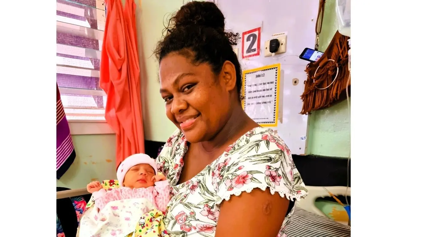 Mother, Fane Sivoki, 28, with her newborn daughter, delivered on New Year’s Eve, at Labasa Divisional Hospital. 