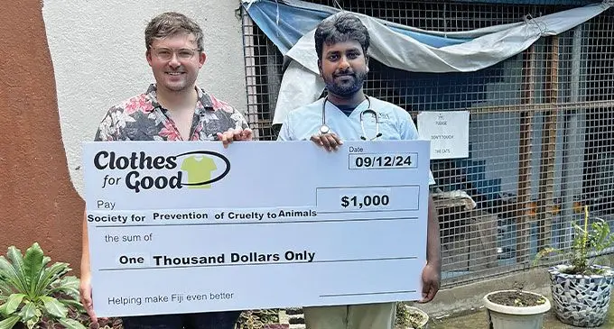 Clothes for Good founder Hayden Ostrom-Brown {left), with Dr Immanuel Bernard of SPCA.