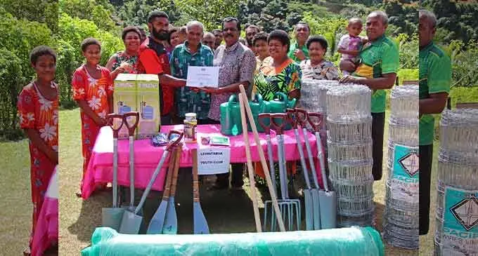 The Minister for Youth and Sports, Parveen Bala hands over farming items to Ba youths. Photo: Ministry of Youth and Sports