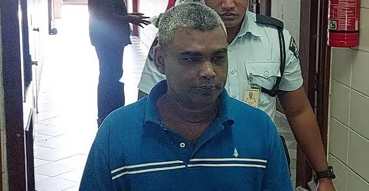 Vinay Darsan is escorted out of the High Court in Lautoka on February 20,2023. Photo: Salote Qalubau