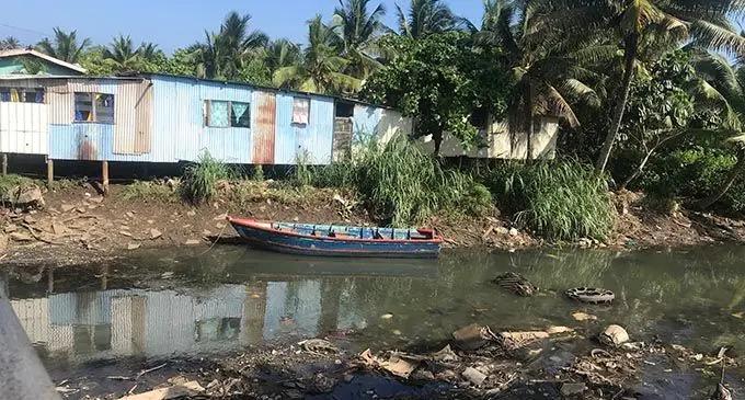 Houses at the Wailea informal settlement beside the polluted Wailea Creek in Vatuwaqa.