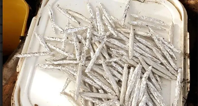 Police found 200 rolls of dried leaves wrapped in aluminium foil believed to be marijuana. 