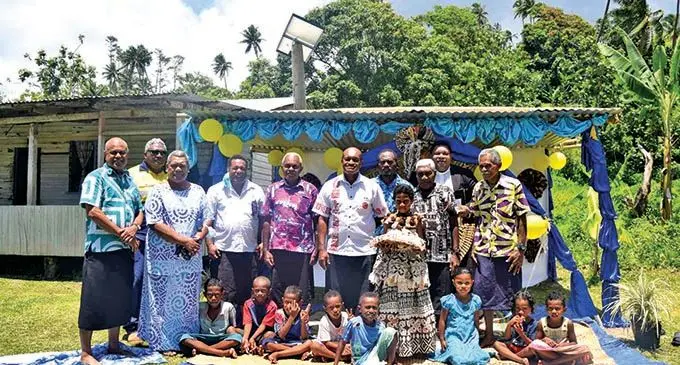 Minister for Lands and Mineral Resources Jone Usamate (middle) with the people of Sese Village in Macuata after commissioning a borehole project on December 15, 2021.