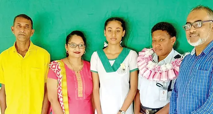 Ahmadiyya Muslim College Head girl Zaiba Bano along with her family chief quest and school principal on April-28-2022.
