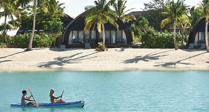 Guests enjoying a row on the open waters of the Fiji Marriott Resort Momi Bay.