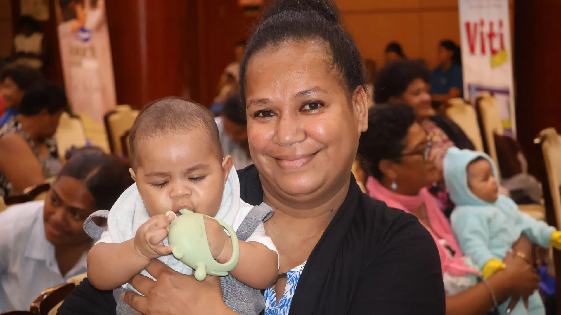 Matelita Bale with her four-month-old baby, Apisalome Jock, at the Hibiscus Festival Baby Show on September 23, 2025.