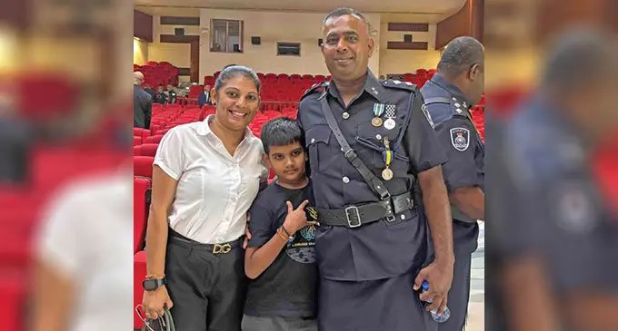 Arjun Kumar, 10, flanked by his parents, mum Sanjeeta Sharma and father Inspector Avinesh Kumar after the medal ceremony at the Suva Civic Centre on January 6, 2025. Photo: Beranadeta Nagatalevu 