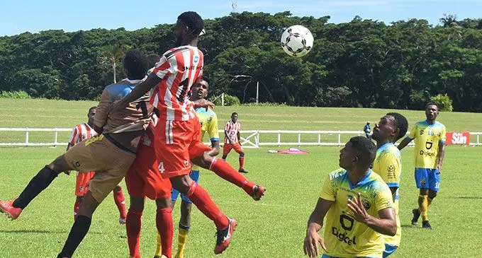 Labasa goalkeeper Atunaisa Naucukidi and Akeimi Ralulu under pressure from the Nadroga strikers on March 13, 2022. Photo: Waisea Nasokia