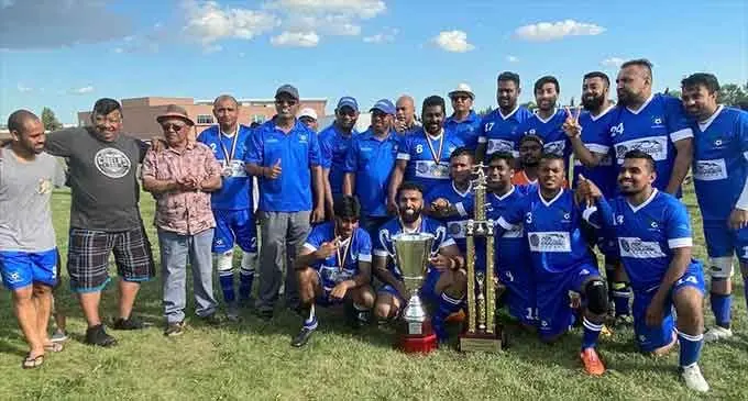 The victorious Canada Lautoka team and officials with their spoils. PHOTO SUPPLIED