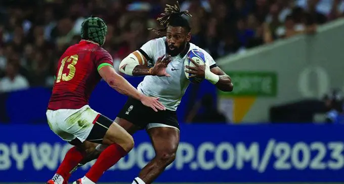 Portugal’s outside centre Pedro Bettencourt tries to tackle Fiji’s outside centre and captain Waisea Nayacalevu during the France 2023 Rugby World Cup Pool C match between Fiji and Portugal at the Stade de Toulouse in Toulouse, southwestern France on October 8, 2023. Photo: Valentine CHRAPUIS / AFP) 