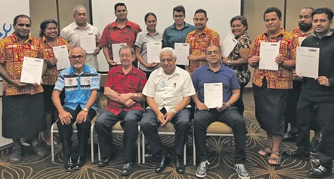 Front (from left) Team Fiji chef de mission Patrick Bower, Fiji National Sports Commission chairman Peter Mazey, ONOC president Dr Robin Mitchell, USP head of journalism Shailendra Singh. Back- sports journalists with certificates after symposium at the Holiday Inn, Suva on April 24, 2019. Photo: FASANOC