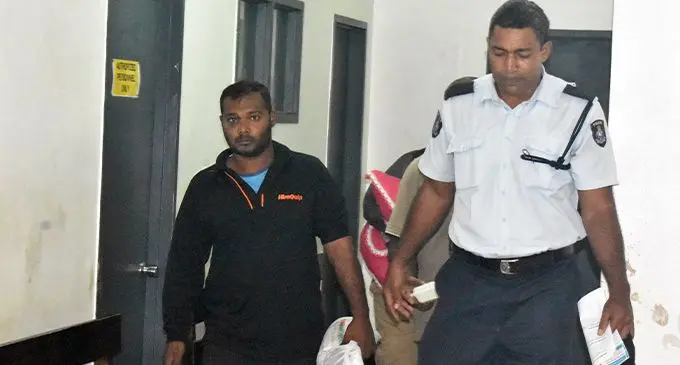Saiyad Muktar Nabi is escorted out of the Magistrates Court in Nadi on September 5,2022. Photo: Salote Qalubau