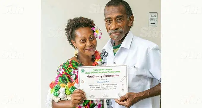 Merewairita Raciva with her father Vueti Raciva after the Makoi Women’s Vocational Training Centre graduation on January 13, 2021. Photo: Leon Lord