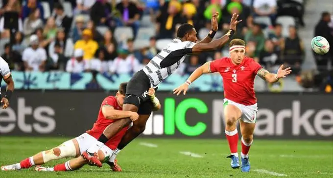 Wales and Fiji vie for the ball. Photo: AFP