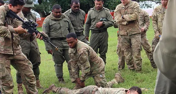 Personnel from the US Army and the Republic of Fiji Military Forces during an urban tactical exercise in Savusavu on August 5, 2019. 