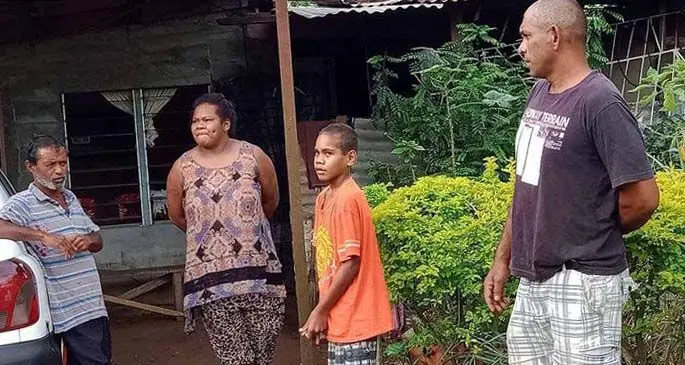 Daniel Kumar (left), with his new family at his home in Naikabula, Lautoka.