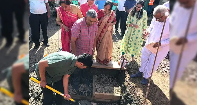 Newly-appointed Ashabhai Group of Companies Director, Shivam Patel, breaks ground during the event at Viria East, Vatuwaqa while his uncle, Harish Patel, also a Director with other family members and guests look on. Photo: Laisa Lui