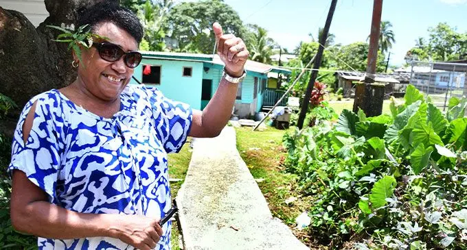 Burekalou Villager Torika Valamalua celebrate the commissioning of the village footpath on December 20, 2024. Photo: Ronald Kumar