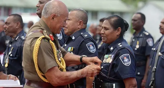 President Jioji Konrote awards Inspector Savita Datt with 50th anniversary of Independence commemorative Medal at Police Nasova ground on November 13, 2020. Photo: Ronald Kumar.