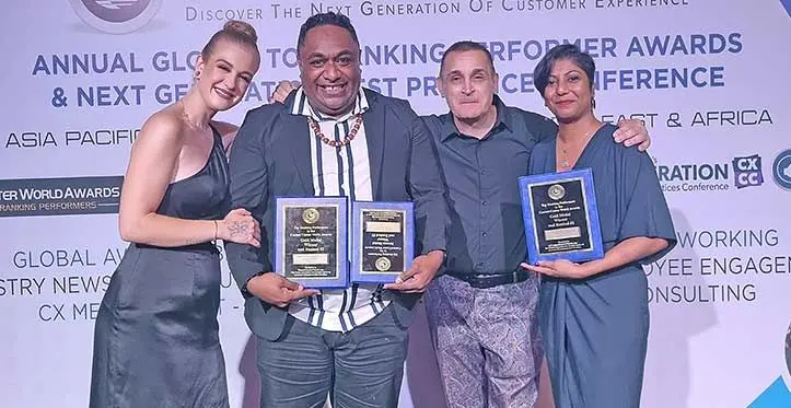 Customer care representatives Sefanaia Silimaibau (second from left) and Doreen Lakhan(fourth from left) while receiving their awards in Bali, Indonesia.