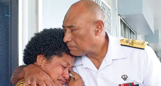 Lute Tubuna is comforted by RFMF Commander Rear Admiral Viliame Naupoto during the morning tea at Walu Bay, Suva, on May 19, 2020.  Photo: Ronald Kumar