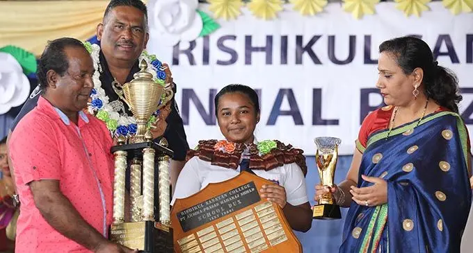 From left: Jai Singh (Shayal Singh's Father), Acting Deputy Commissioner of Police Itendra Nair, Rishikul Sanatan College Dux SHayal Singh  and Principal Rose Sharma during the Rishikul Sanatan College annual prizegiving ceremony on December 3, 2020. Photo Police Media Cell