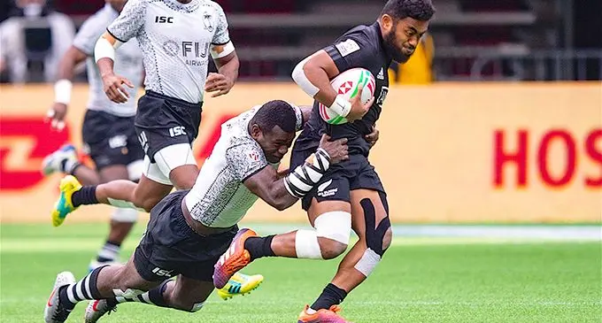 Fiji Airways Fijian 7s rep Asaeli Tuivoka tackles New Zealand’s Vilimoni Koroi at the Canada 7s in Vancouver on March 11, 2019. Photo: Ian Muir