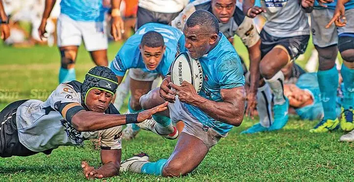 FMF Suva centre Tiwa Wilagi (with ball) is tackled by Nadroga players during their Skipper Cup clash at Bidesi Park, Suva, on July 8, 2023. Photo: Leon Lord
