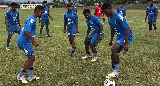 Digicel Fijian football defenders control the ball as striker Setareki Hughes (24) closes in during training at the Fiji Football Academy in Ba.. Photo: Waisea Nasokia