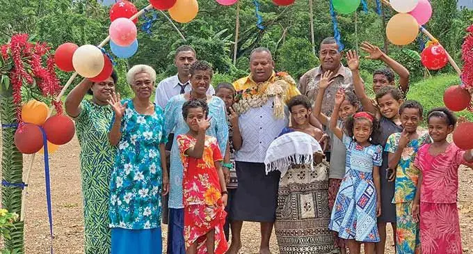 Minister for Defence, National Security and Policing, Rural and Maritime Development and Disaster Management Inia Seruiratu (middle) with villagers during the commissioning of the community access road in Navetau Village in Cakaudrove on March 17, 2022. Photo: Ministry of Rural and Maritime Development 