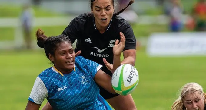 Krystelle Thaggard (with ball) is tackled by Stacey Waaka during their pool match at Lawaqa Park, Sigatoka on January 16, 2025. Photo: Ioane Asioli