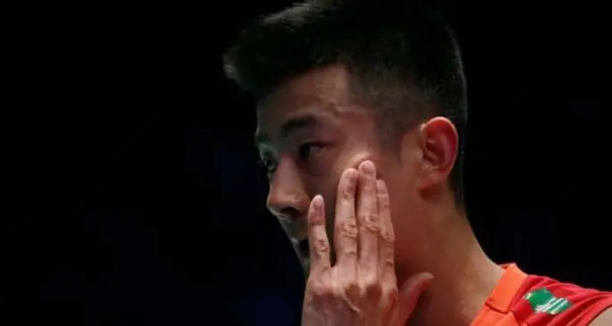 Reigning Olympic champion Chen Long of China loses to Malaysia's Lee Zii Jia in the men's singles quarterfinals at the All England Open Badminton Championships in Birmingham, Britain, on March 13, 2020. (Xinhua/Tim Ireland)
