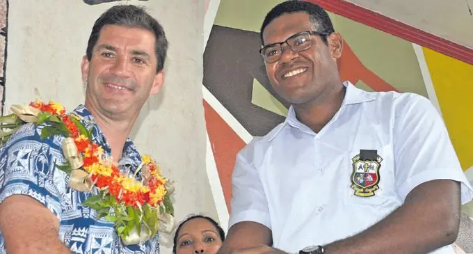 Marist Brothers High School Head-Boy Christopher Minimbi with Fiji  National 7's coach, Gareth Barber following their prefect induction on February 9, 2017. Photo: Ronald Kumar.