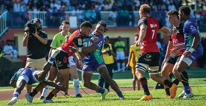 Swire Shipping Fijian Drua winger Selesitino Ravutaumada tackles Crusaders full-back Chay Fihaki while Tom Christie comes in to support during their Shop N Save Super Rugby Pacific clash at Churchill Parl, Lautoka, March 11, 2023. Photo: File