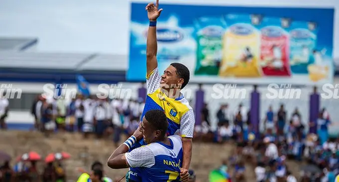 Natabua High School Under-18 players celebrate their 21-19 win over Queen Victoria School at the HFC Bank Stadium, Suva, today. Photo: Leon Lord