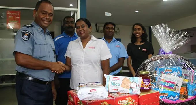 Punjas Group of Company Human Resources manager Sharon Prasad with Special Inspector of Police Penjamini Vukivou and staff members and officials during the visit to the office on February 5, 2019.  Photo: Police Media Cell 