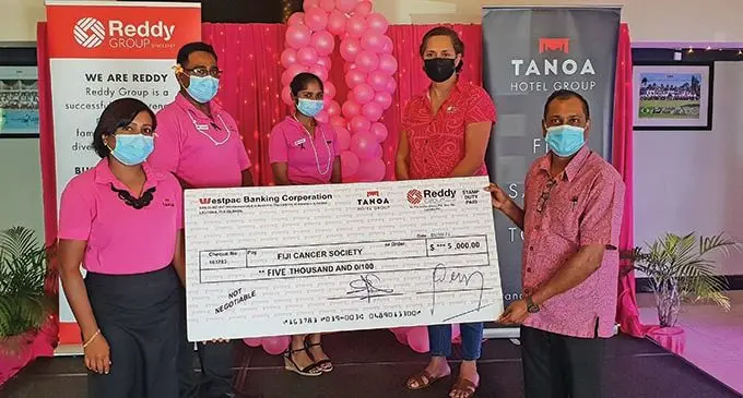 Tanoa Hotel Group Area General Manager Fiji, Narend Kumar (right) handing over the cheque to the Fiji Cancer Society chief executive officer, Belinda Chen (second from right) along with other Tanoa Hotel Group staff at the Tanoa Waterfront Hotel in Lautoka on October 22, 2021. Photo: Nicolette Chambers