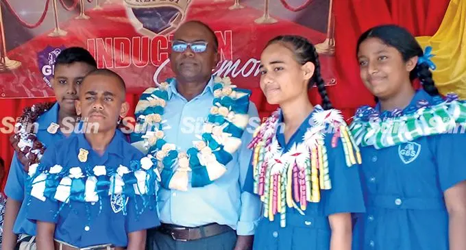 From left: Gandhi Bhawan Primary School deputy head boy Rethart Kumar, head boy Eneriko Turaga, chief guest Ajay Builders Limited Managing Director Ajay Kumar, head girl Lanieta Apao and deputy head girl Suhana Devi on May 6, 2022.