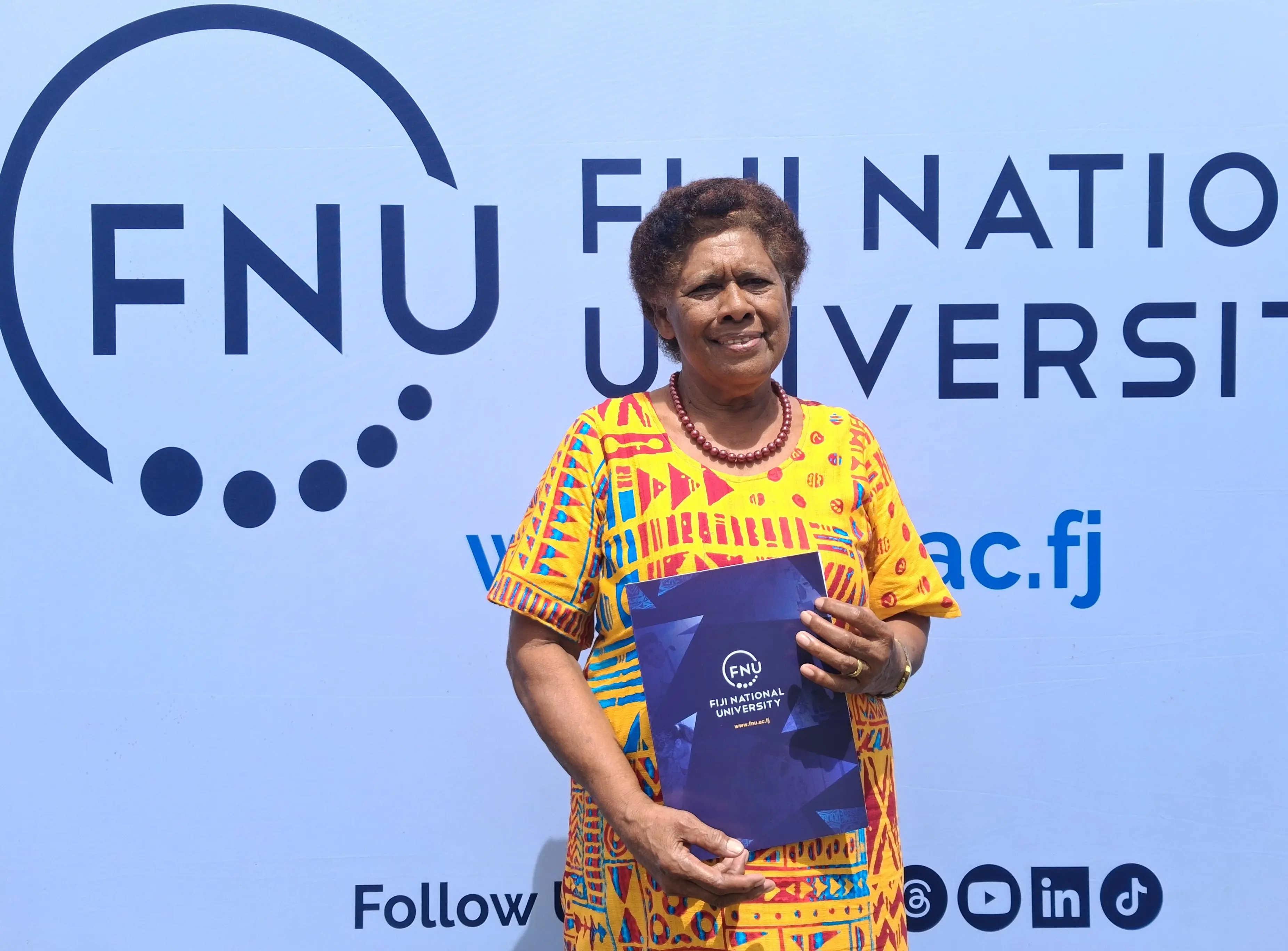 Village leader proves learning never stops at 74