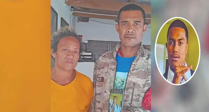 Adi Halaiwalu Vika with husband Ilikena Waqabaca Neivusa holds a photo of their son, Salesi Vakatawa at their home in Malolo, Nadi. Photo: Waisea Nasokia/ Inset: Salesi Vakatawa
