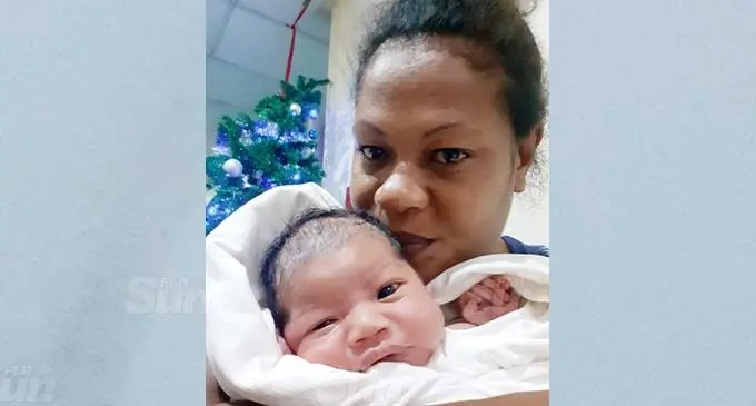 Mere Bui with her Christmas baby, Merewalesi Vere at the Colonial War Memorial Hospital maternity unit on December 25, 2020. Photo: Ronald Kumar