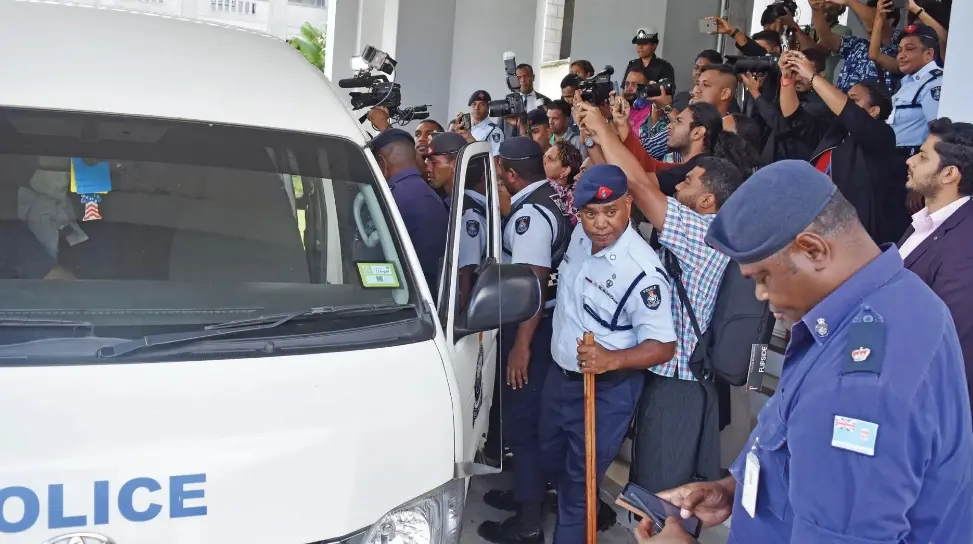 Journalists covering a major court case in Suva. 