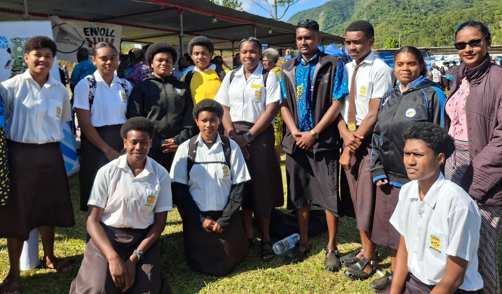 Rohen Goundar (4th standing from right) with a teacher and students of Nadarivatu High School. 