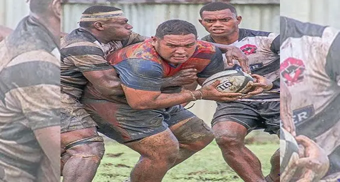 Namosi Development take on Rewa Development in a muddy Thomson Park, Navua, today. Photo: FRU Media.