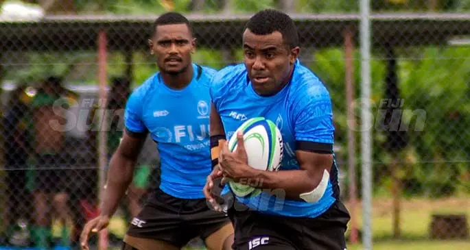 Fijian Sevens player Kitione Taliga attacks against Cross of Victory Deuba during the Mobil Uprising Sevens tournament in Pacific Habour, on February 5, 2021. Photo: Leon Lord