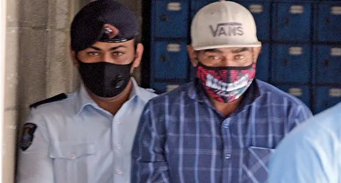 Nanuku murder accused, Sinaniolo Vunakece 44  escorted to Court in Suva on 27, October 2021. Photo: Ronald Kumar