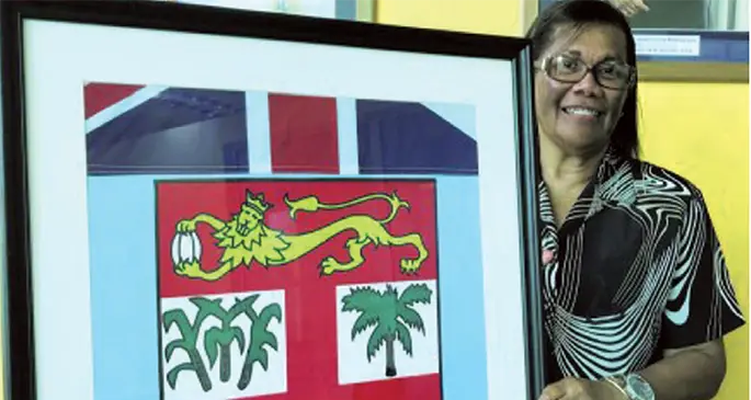 Picture taken of the late Litia Mawi in 2018. She was holding her gift from the Ministry of Foreign Affairs and staff members. Photo: Losirene Lacanivalu.