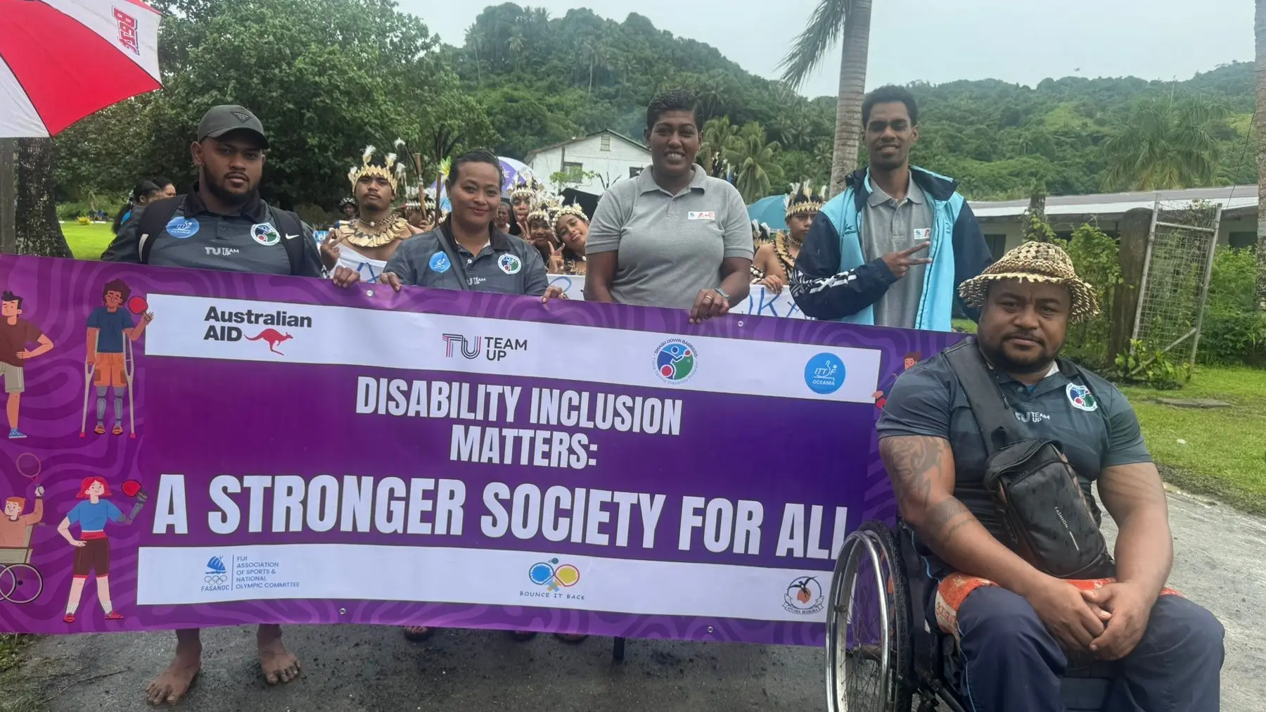 The Smash Down Barriers program In-Country Manager for Fiji, Harvi Yee (second from left) with members of the program during the 80th anniversary celebrations in Rabi.