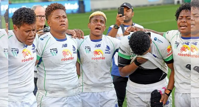 Fijiana Drua players {from left), Sereima Leweniqila, Vika Matarugu, Roela Radiniyavuni, Joma Rubuti, and Karalaini Naisewa after their victory in the women's Super W final in Melbourne, Australia, on April 23, 2022. The Fijiana women claimed the Super W title in a thrilling 32-26 win over the New South Wales Waratahs. Photo: William West /AFP 